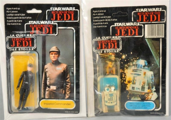 LOT OF 2: STAR WARS TRI-LOGO CARDED FIGURES.      