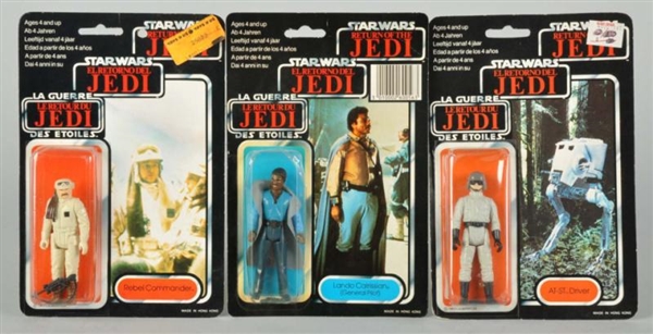 LOT OF 3: STAR WARS TRI-LOGO CARDED FIGURES.      