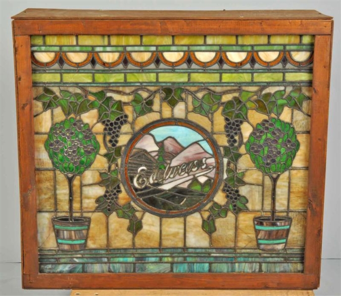LARGE LEADED GLASS WINDOW IN LIGHTED BOX.         