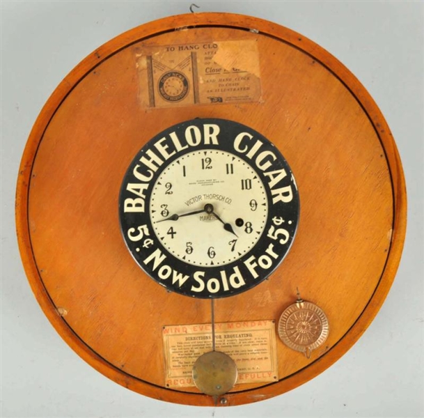 BACHELOR CIGAR 2-SIDED ADVERTISING CLOCK.         