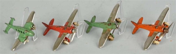 LOT OF 4: CAST IRON HUBLEY AIRPLANE TOYS.         