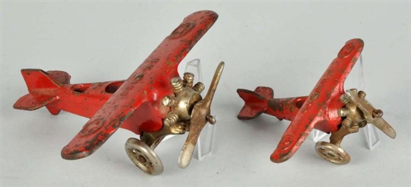 LOT OF 2: CAST IRON AIRPLANE TOYS.                