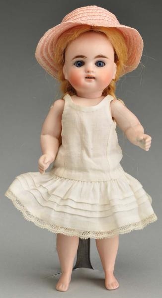 KESTNER ALL BISQUE DOLL WITH BARE FEET.           