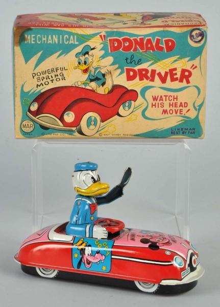 TIN LINEMAR DISNEY DONALD THE DRIVER WIND-UP TOY. 