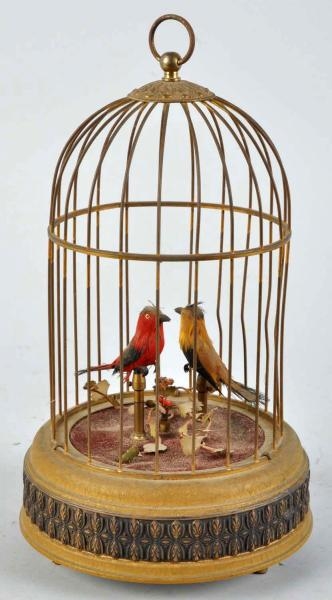 GERMAN-MADE SINGING BIRDS IN CAGE.                