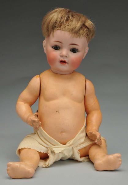 CUTE K & R 121 CHARACTER BABY DOLL.               