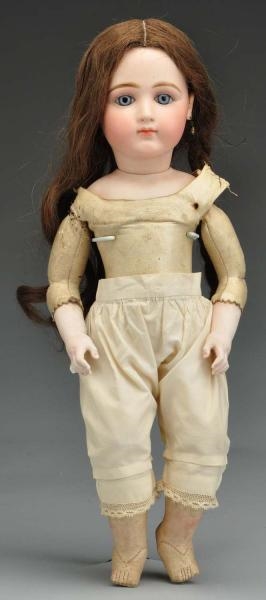 EARLY FRENCH BISQUE BÉBÉ DOLL.                    