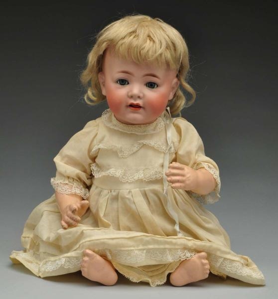 UNUSUAL K & R 128 CHARACTER BABY DOLL.            