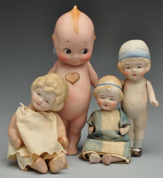 LOT OF 4: BISQUE DOLLS.                           