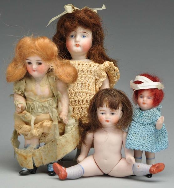 LOT OF 4: ALL BISQUE DOLLS.                       
