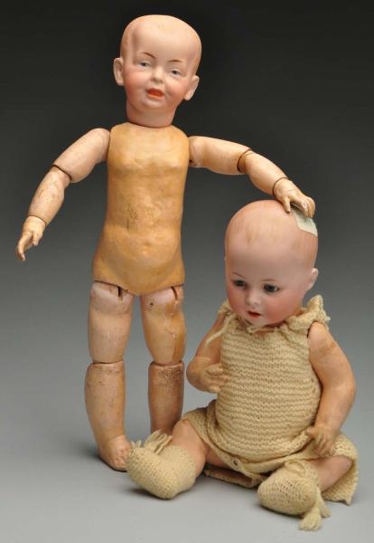 TWO BISQUE CHARACTER DOLLS.                       