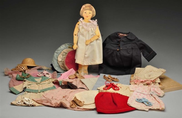LOT OF DOLL CLOTHING.                             