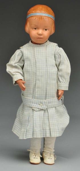 SCHOENHUT CHARACTER DOLL WITH CARVED HAIR.        