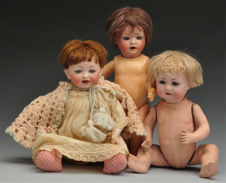 LOT OF 3: CHARACTER BABY DOLLS.                   