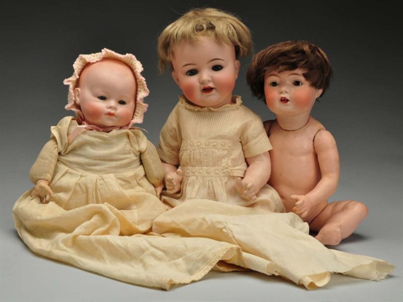 LOT OF 3: CHARACTER BABY DOLLS.                   