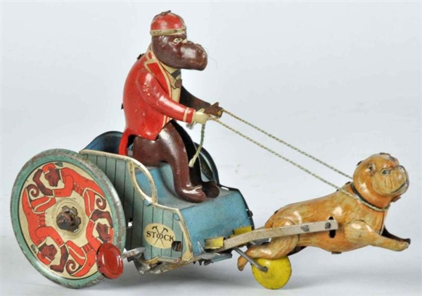 TIN LITHO STRAUSS JOLLY-PALS WIND-UP TOY.         