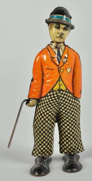 TIN LITHO CHARLIE CHAPLIN WADDLER WIND-UP TOY.    
