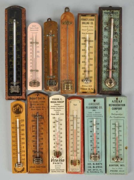 LOT OF 12: WOODEN ADVERTISING THERMOMETERS.       