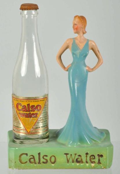 PLASTER CALSO WATER BOTTLE STATUE.                