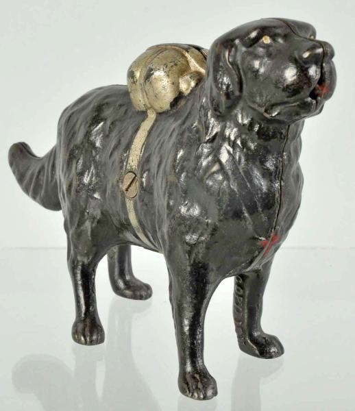 CAST IRON WATER SPANIEL WITH PACK STILL BANK.     