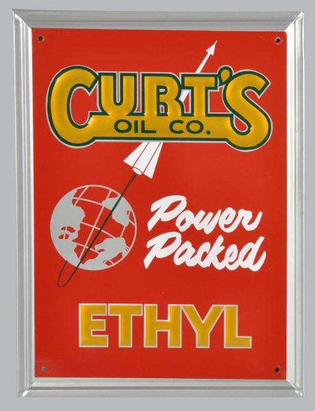 EMBOSSED TIN CURTIS OIL COMPANY SIGN.             