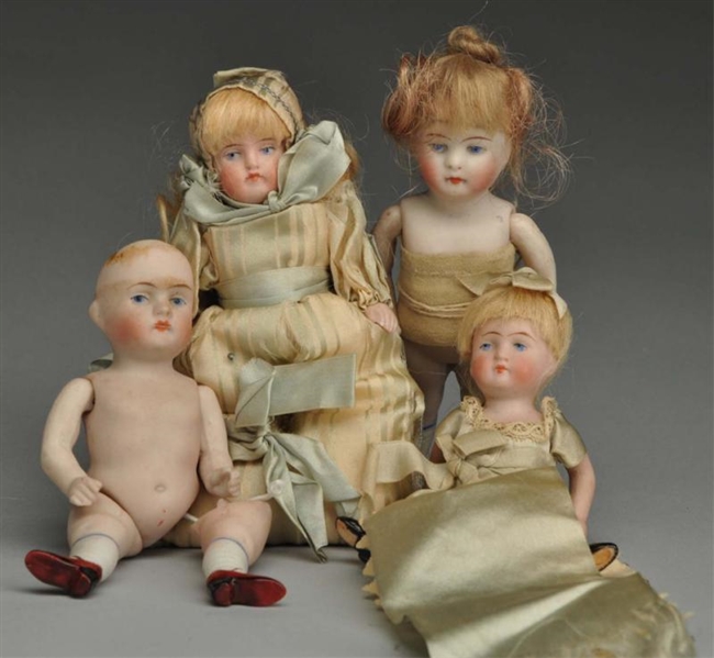 LOT OF 4: ALL BISQUE GERMAN DOLLS.                