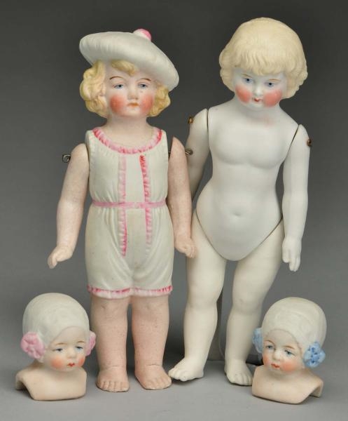 LOT OF GERMAN ALL BISQUE DOLLS & HEADS.           