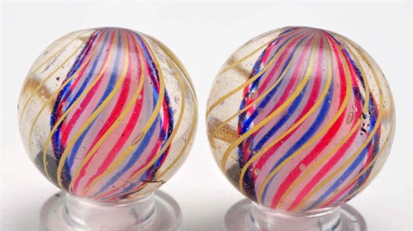 LOT OF 2: 3-STAGE SOLID CORE SWIRL MARBLES.       