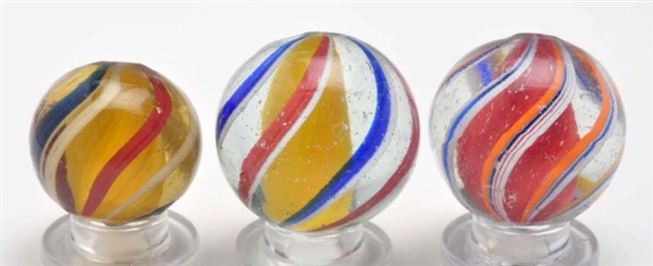 LOT OF 3: SOLID CORE SWIRL MARBLES.               