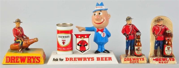 LOT OF 4: DREWRYS BEER ADVERTISING FIGURES.      