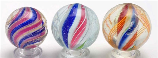 LOT OF 3: SOLID CORE SWIRL MARBLES.               