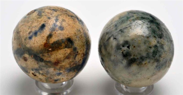 LOT OF 2: STONEWARE MARBLES.                      