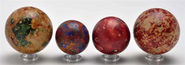 LOT OF 4: LARGE CLAY MARBLES.                     