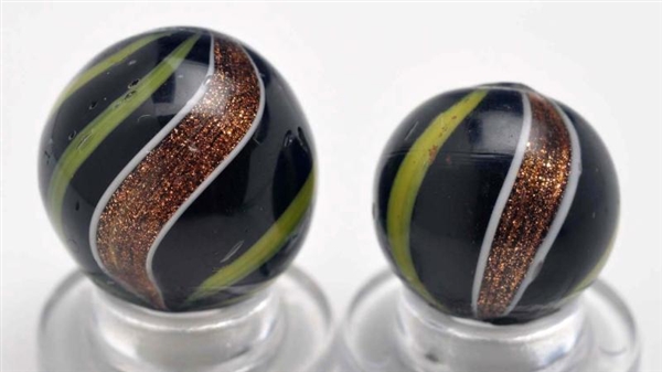 LOT OF 2: BLACK OPAQUE BANDED LUTZ MARBLES.       