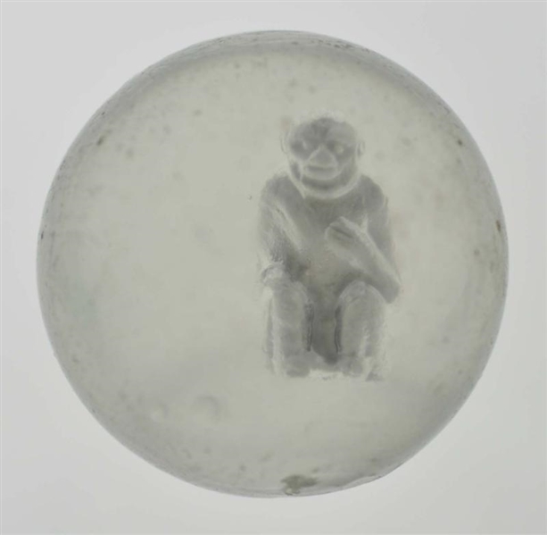 MONKEY SITTING WITH HAND ON CHEST SULPHIDE MARBLE 