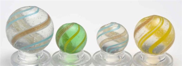 LOT OF 4: LUTZ MARBLES.                           