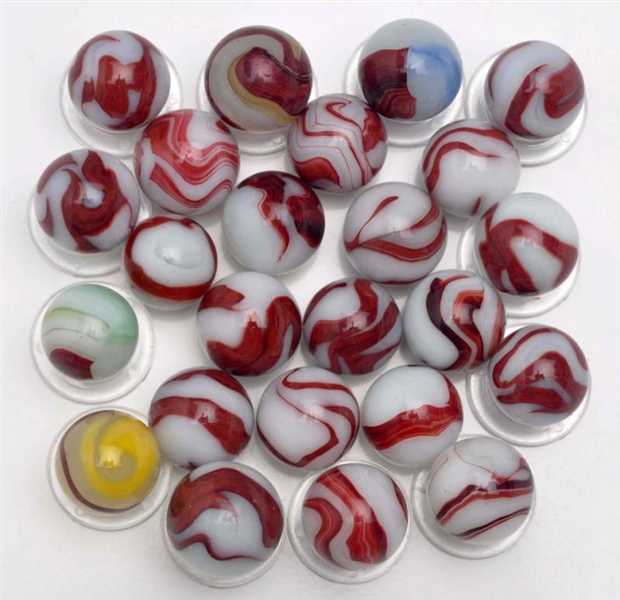 LOT OF 24: AKRO AGATE OXBLOOD MARBLES.            