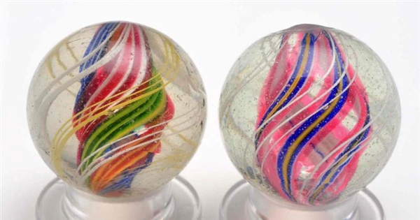 LOT OF 2: DIVIDED CORE SWIRL MARBLES.             
