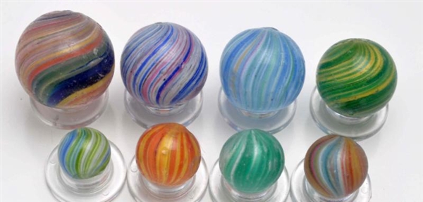 LOT OF 8: ASSORTED ONIONSKIN MARBLES.             
