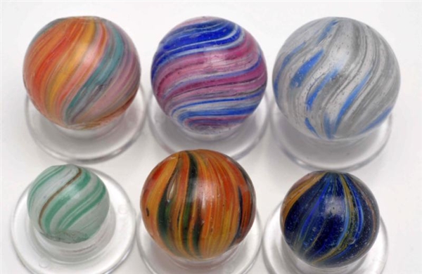 LOT OF 6: ASSORTED ONIONSKIN MARBLES.             