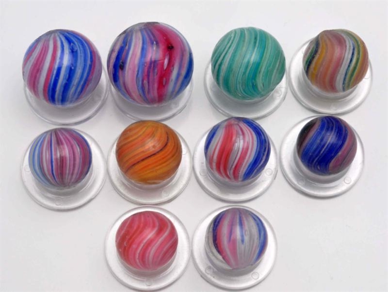 LOT OF 10: ASSORTED ONIONSKIN MARBLES.            