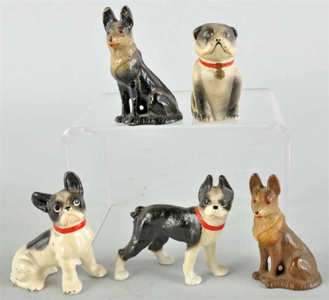 LOT OF 5: CAST IRON DOG PAPERWEIGHTS.             