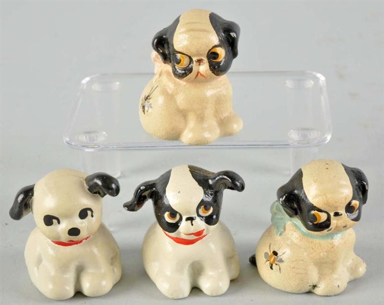 LOT OF 4: CAST IRON HUBLEY PUPPO PAPERWEIGHTS.    