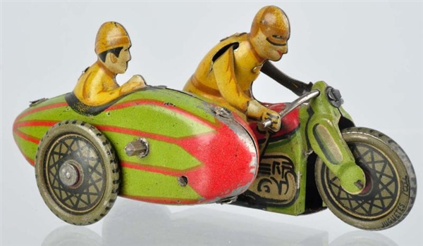 SCARCE TIN LITHO MOTORCYCLE WIND-UP PENNY TOY.    