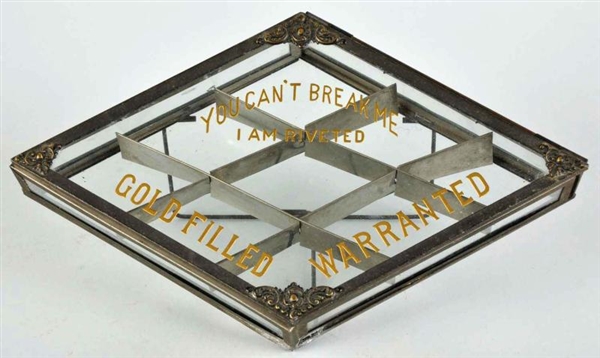 GOLD-FILED DIAMOND-SHAPED DISPLAY CASE.           