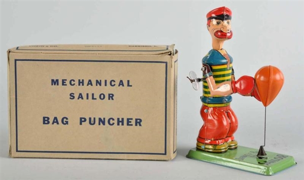 TIN CHEIN BARNACLE BILL BAG PUNCHER WIND-UP TOY.  