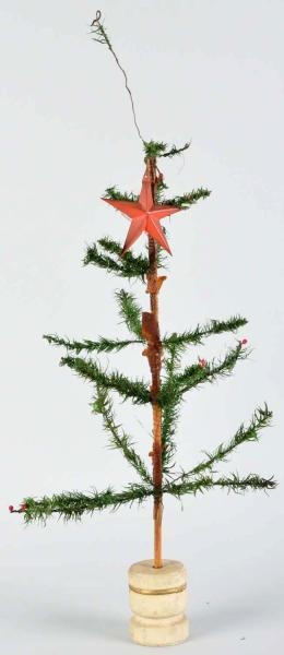 CHRISTMAS FIR TREE WITH WOODEN BASE.              