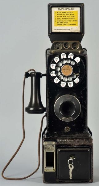 GRAY/WESTERN 2-PIECER 3-SLOT TELEPHONE.           