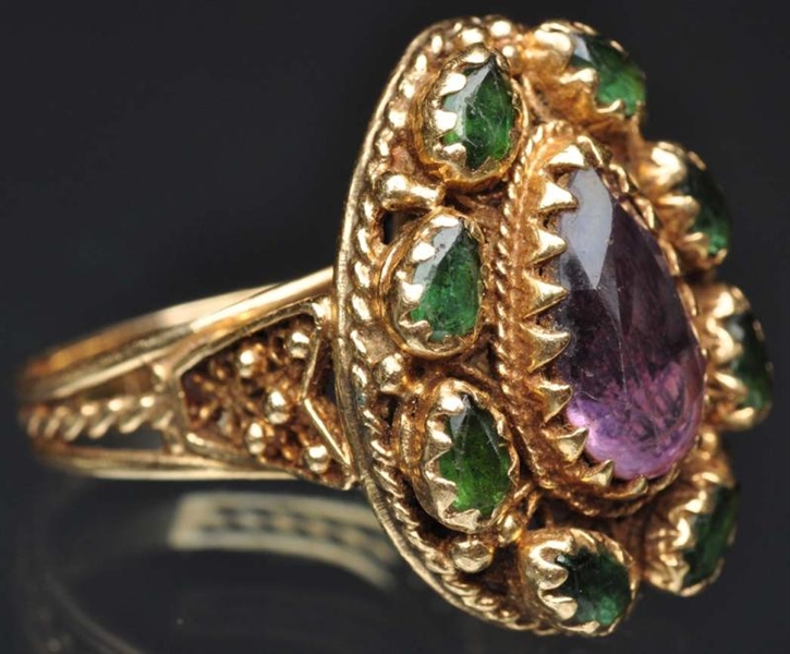 14K Y. GOLD RING WITH AMETHYST & GREEN STONES.    