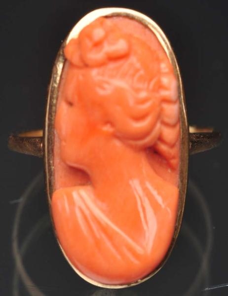 18K Y. GOLD PINK CORAL CAMEO RING.                